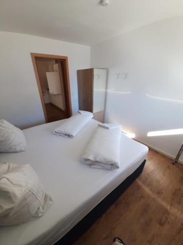 Postel nebo postele na pokoji v ubytování Ferienhaus Kolbnitz