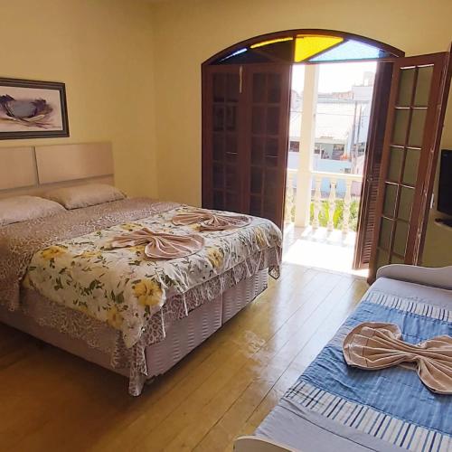 Cama ou camas em um quarto em Pousada Morena Flor