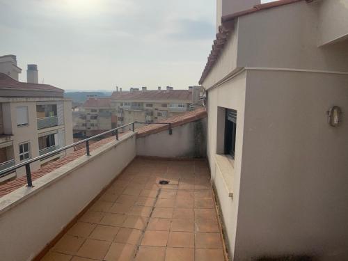 a balcony of a building with a view of a city at VUT SEGEDA Valle del Manubles in Calatayud