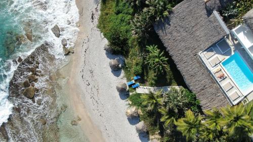 Бассейн в Casa del Mar Lodge Barahona или поблизости