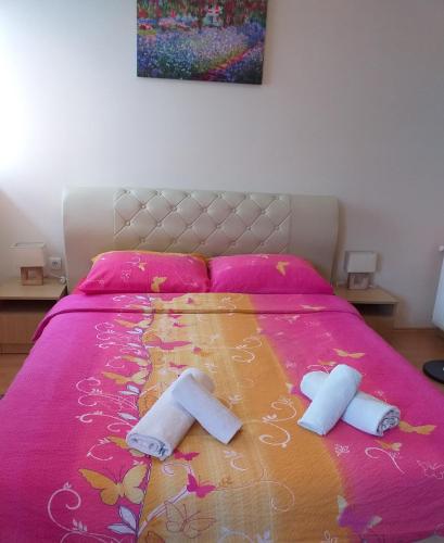 Postel nebo postele na pokoji v ubytování Sun City Apartments
