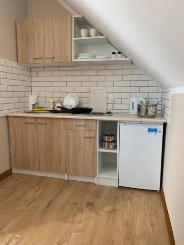Η κουζίνα ή μικρή κουζίνα στο Domki i apartamenty "Nadmorska 27A"