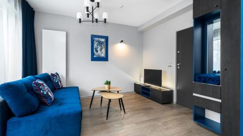 TV a/nebo společenská místnost v ubytování Comfy Apartments - Park Technologiczny