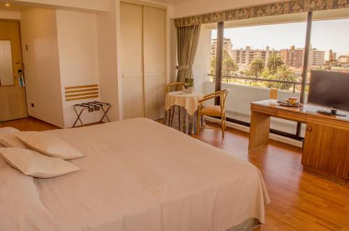 TV a/nebo společenská místnost v ubytování Gala Hotel