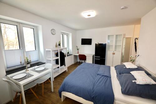 Postel nebo postele na pokoji v ubytování Frundsberg-Apartment