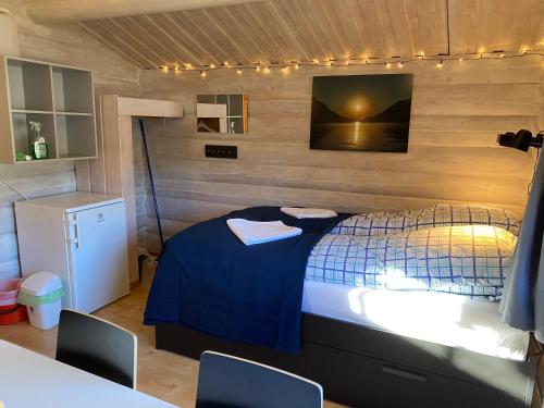 Ένα ή περισσότερα κρεβάτια σε δωμάτιο στο Sandviken Camping