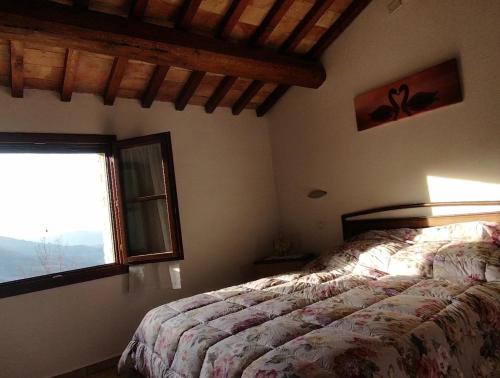 Кровать или кровати в номере Agriturismo Ca'pierello