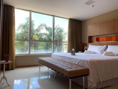 Cama o camas de una habitación en Aconchegante Apartamento em Brasília