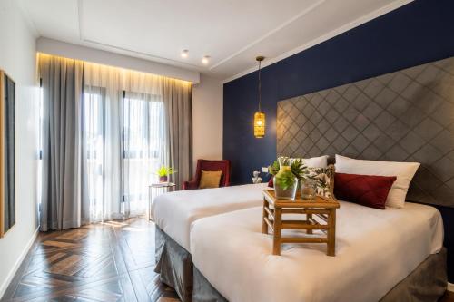 Postel nebo postele na pokoji v ubytování Eldan Hotel