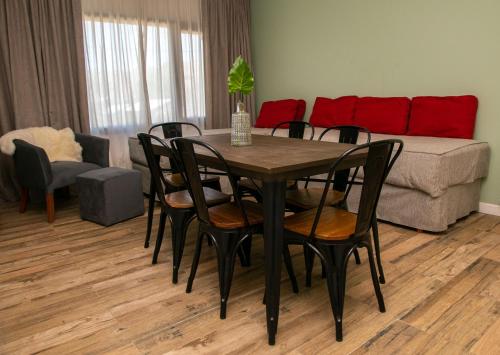 Гостиная зона в Senderos Aparts & Suites