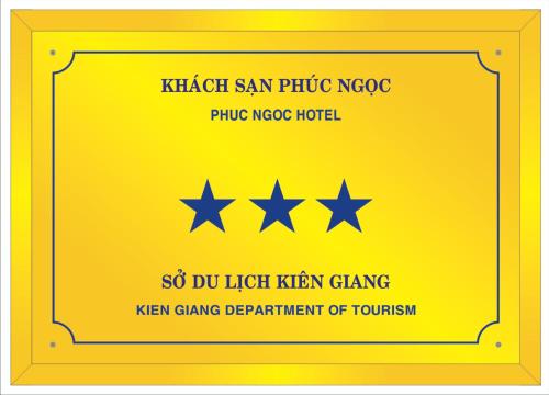a yellow sign with four stars on it at Phuc Ngoc Hotel in Ap Rạch Soi