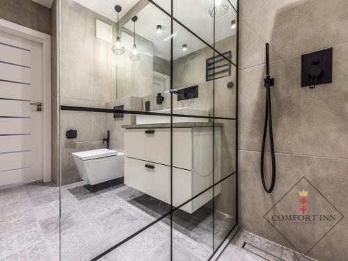 Kúpeľňa v ubytovaní COMFORT INN APARTMENTS - Gdansk, Sadowa