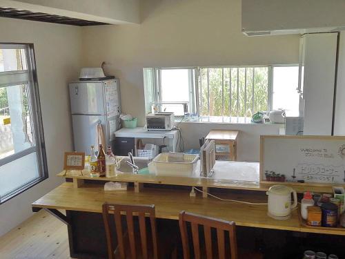 Dapur atau dapur kecil di Guest House Miyakojima
