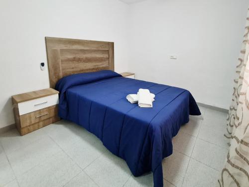 Katil atau katil-katil dalam bilik di Apartamento completo Plaza España II