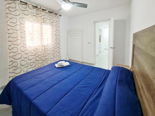 Katil atau katil-katil dalam bilik di Apartamento completo Plaza España II