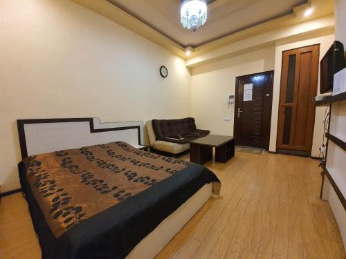 
Кровать или кровати в номере Tatev Apartments
