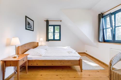 Postel nebo postele na pokoji v ubytování Am Achterwasser DORF 12