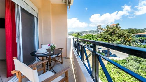 a balcony with a table and a view at Amversa's House in Potos