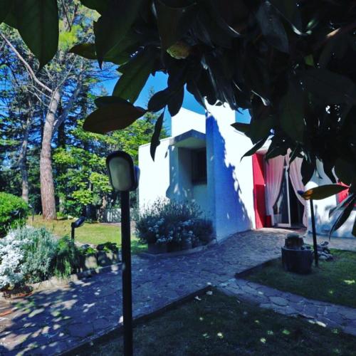 a house with a street light in front of it at Villa Tanya in Trebbiantico
