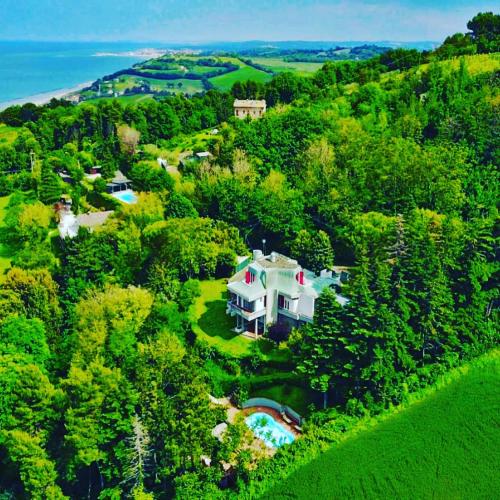 an aerial view of a house on a hill at Villa Tanya in Trebbiantico
