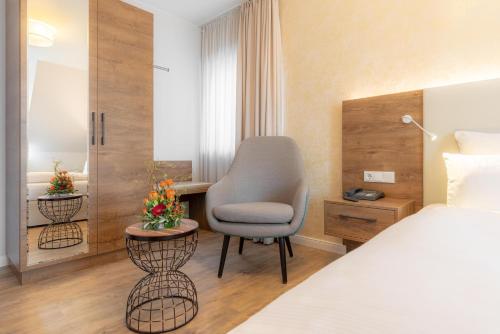 Postel nebo postele na pokoji v ubytování Hotel Engel