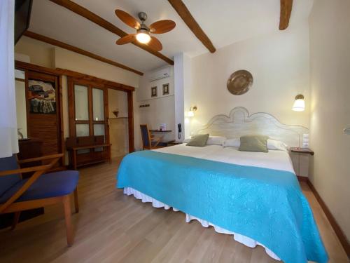 Postel nebo postele na pokoji v ubytování Gara Hotel