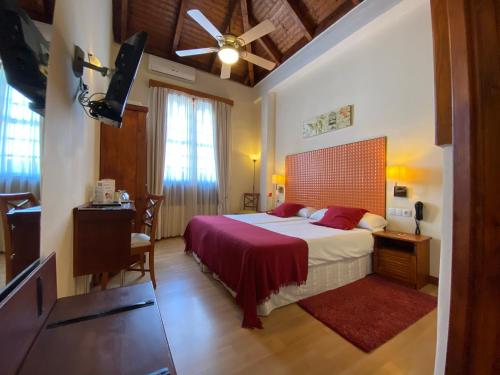 Postel nebo postele na pokoji v ubytování Gara Hotel