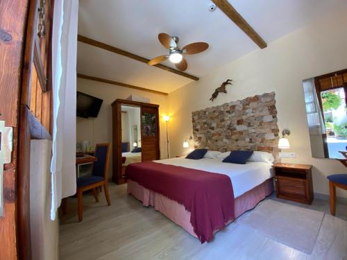 Postel nebo postele na pokoji v ubytování Gara Hotel