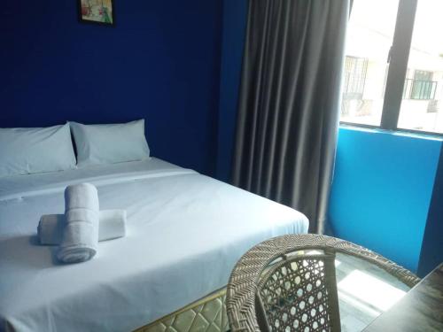 Cama o camas de una habitación en Sky View Hotel Dengkil PUTRAJAYA