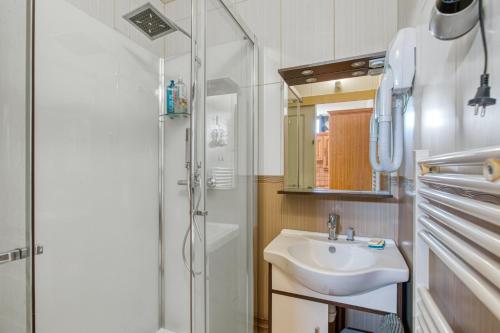 a bathroom with a sink and a shower at Appartement de 2 chambres avec terrasse et wifi a Saint Jacut de la Mer in Saint-Jacut-de-la-Mer