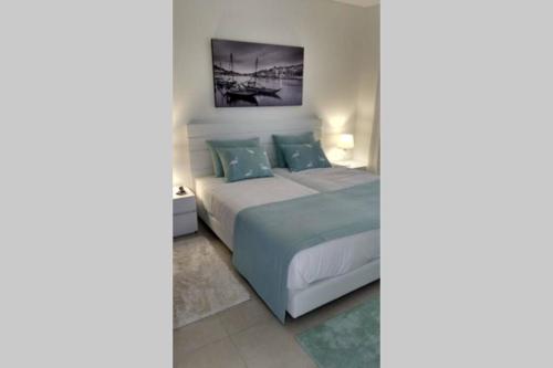 Cama ou camas em um quarto em Gino´s House