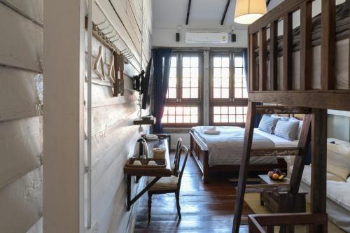 Velawarin Hotelにあるベッド