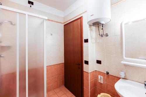 Koupelna v ubytování Pioppi Lido Altanea