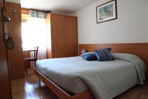 Una cama o camas en una habitación de Hotel Bellavista