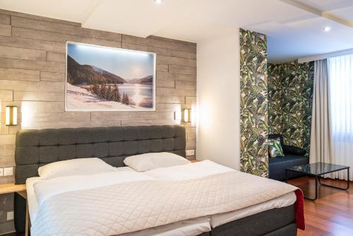 Postel nebo postele na pokoji v ubytování Hotel Europe