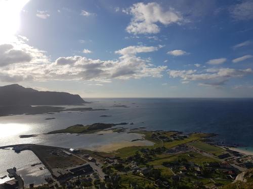 an aerial view of the ocean with the sky at Hus på vakre Ramberg fra 1904 in Ramberg
