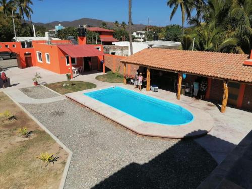 O vedere a piscinei de la sau din apropiere de Aventuras Mex Y Can