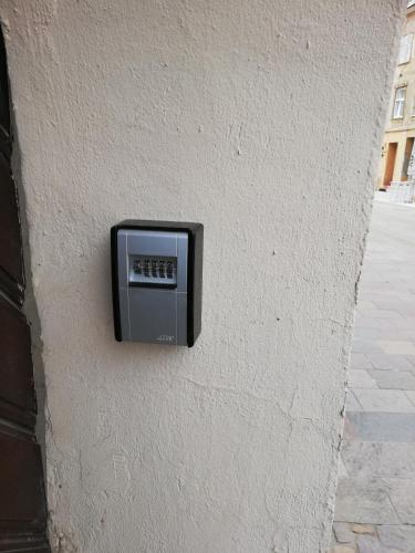 a television on the side of a building at Apartment Frenki- Tkalčićeva -self check in-free parking in Zagreb