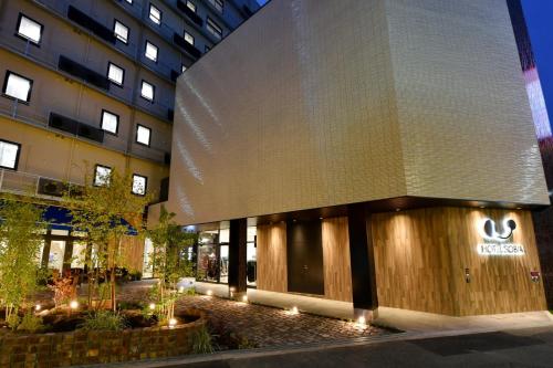 大阪市にあるホテルソビアル大阪 ドーム前の光の建物の外観