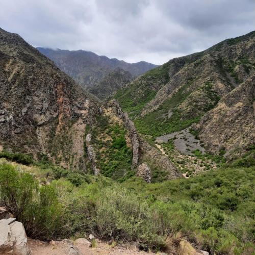 a mountain view of a valley in the mountains at Piazza Mendoza in Mendoza