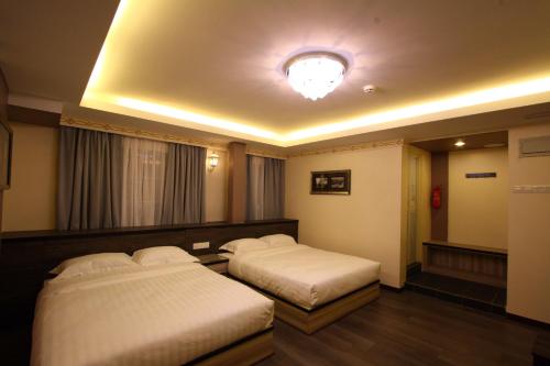 Postel nebo postele na pokoji v ubytování Shamrock Guest House