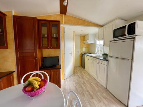 Jura mobile homeにあるキッチンまたは簡易キッチン