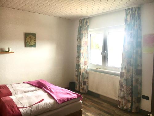 Postel nebo postele na pokoji v ubytování Antjes kleines Nest