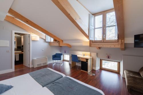 TV a/nebo společenská místnost v ubytování Hotel El Coloquio