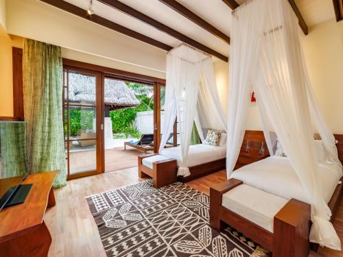 Postel nebo postele na pokoji v ubytování OZEN RESERVE BOLIFUSHI - Luxury All Inclusive with Free Transfers