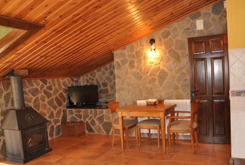 Televízia a/alebo spoločenská miestnosť v ubytovaní Apartamento Los Callejones