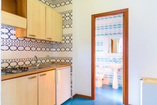 Küche/Küchenzeile in der Unterkunft Appartamenti La Baia Lido