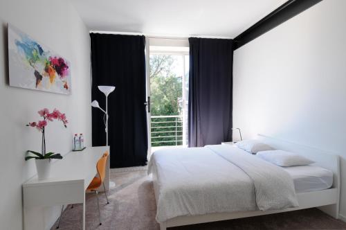 Posteľ alebo postele v izbe v ubytovaní B@Home Apartments