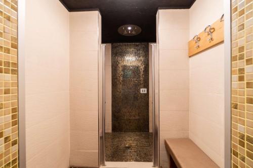 a walk in shower with a glass door in a bathroom at Best Western Plus Hotel Perla Del Porto in Catanzaro Lido