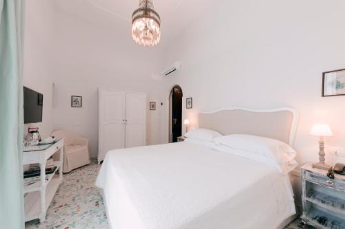 Letto o letti in una camera di Hotel Villa Maria
